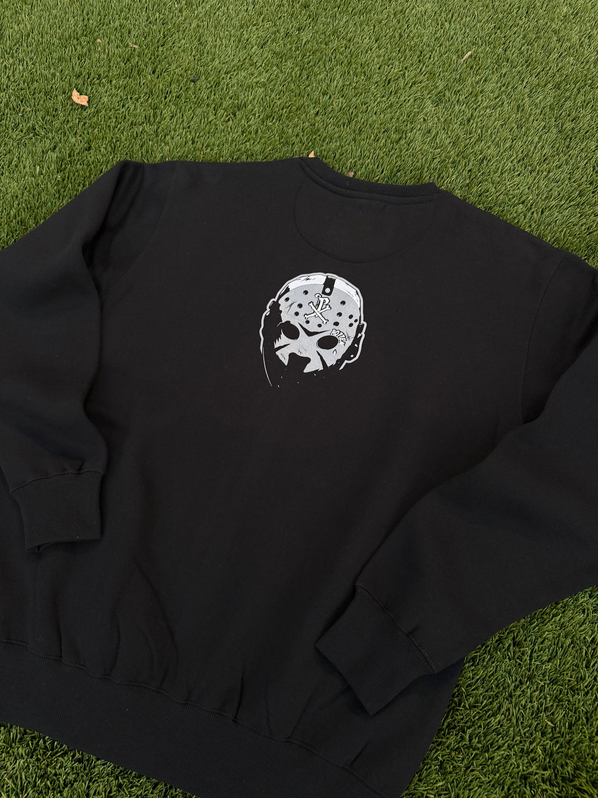 No Face-No Case Crewneck Sweater.