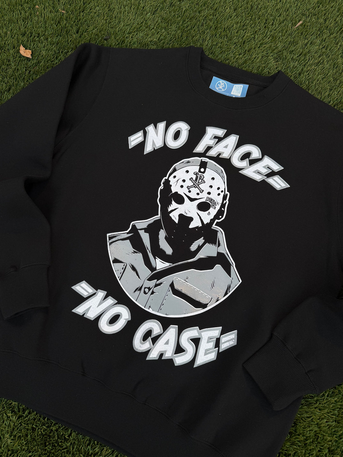 No Face-No Case Crewneck Sweater.
