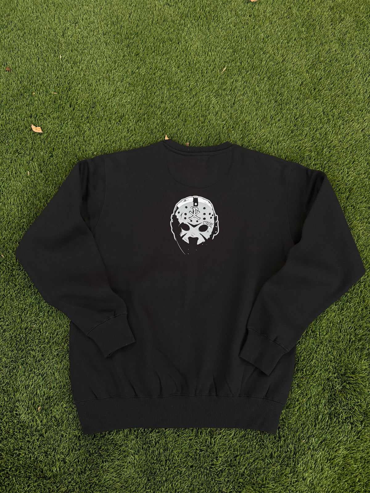 No Face-No Case Crewneck Sweater.
